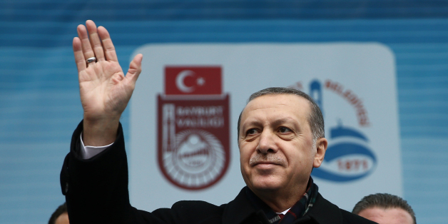 Turkey's President Recep Tayyip Erdogan addresses a rally in Bayburt, Turkey, Friday, Nov. 27, 2015. Russia announced Friday that it will suspend visa-free travel with Turkey amid the escalating spat over the downing of a Russian warplane by a Turkish fighter jet at the Syrian border. Erdogan refused to apologize for the plane's downing, which Ankara said came after it flew for 17 seconds into Turkish airspace. At the same timed, Erdogan said he has tried in vain to speak by phone to Putin to di