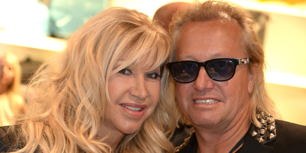 OSNABRUCK, GERMANY - JUNE 02: Robert And Carmen Geiss pose during the opening event of a new Titan Shop on June 2, 2014 in Osnabruck, Germany. (Photo by Nigel Treblin/Getty Images)