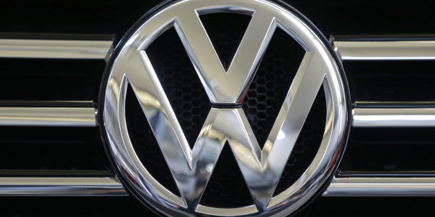 FILE - In this Feb. 14, 2013, file photo, a Volkswagen logo is seen on the grill of a Volkswagen on display in Pittsburgh. New Mexico is suing Volkswagen and other German automakers over an emissions cheating scandal that involves millions of cars worldwide, the first state to do so but almost certainly not the last. (AP Photo/Gene J. Puskar, File)