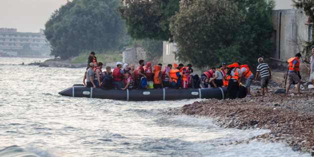 Early in the morning arrival Syrian refugees on the island of Kos in Greece