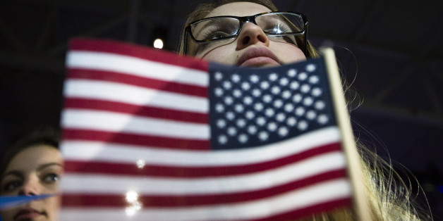 An audience member listens as Democratic presidential candidate Sen. Bernie Sanders, I-Vt., speaks during a campaign stop at the University of New Hampshire Whittemore Center Arena, Monday, Feb. 8, 2016, in Durham, N.H. (AP Photo/John Minchillo)