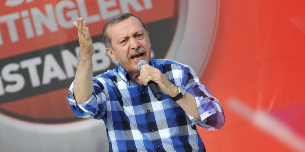 Turkish Prime Minister Recep Tayyip Erdogan makes a speach to supporters during a rally on June 16, 2013, in Istanbul. Turkish Prime Minister Recep Tayyip Erdogan rallied tens of thousands of his supporters in Istanbul on Sunday, hours after ordering a crackdown on anti-government protesters in a city park and sending tensions soaring in two weeks of unrest. AFP PHOTO / OZAN KOSE (Photo credit should read OZAN KOSE/AFP/Getty Images)