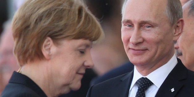 Der russische Präsident Wladimir Putin und Kanzlerin Angela Merkel