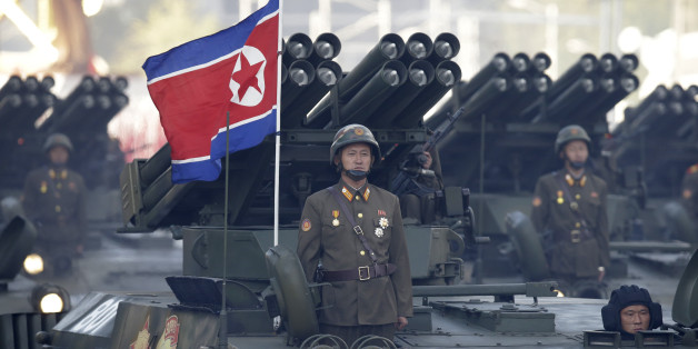 North Korean soldiers stand on armored vehicles with rocket launchers as they parade in Pyongyang, North Korea, Saturday, Oct. 10, 2015. North Korean leader Kim Jong Un declared Saturday that his country was ready to stand up to any threat posed by the United States as he spoke at a lavish military parade to mark the 70th anniversary of the North's ruling party and trumpet his third-generation leadership. (AP Photo/Wong Maye-E)
