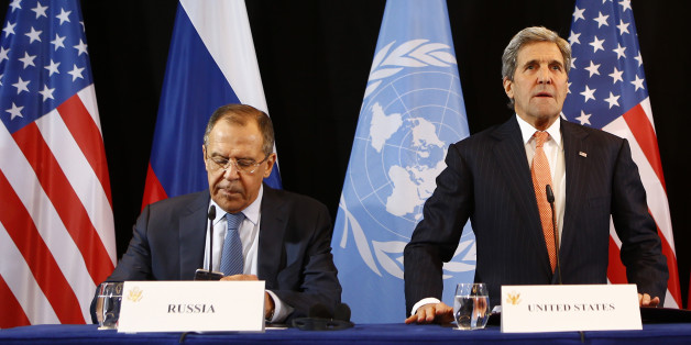 U.S. Secretary of State John Kerry, right, and Russian Foreign Minister Sergey Lavrov arrive for a news conference after the International Syria Support Group (ISSG) meeting in Munich, Germany, Friday, Feb. 12, 2016. (AP Photo/Matthias Schrader)