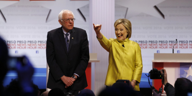 Democratic presidential candidates Sen. Bernie Sanders, I-Vt, left, and Hillary Rodham Clinton take the stage before a Democratic presidential primary debate at the University of Wisconsin-Milwaukee, Thursday, Feb. 11, 2016, in Milwaukee. (AP Photo/Morry Gash)
