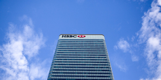 The HSBC Holdings Plc headquarters sits in the Canary Wharf business, financial and shopping district of London, U.K., on Wednesday, Oct. 28, 2015. Europe's largest bank started considering whether to uproot its headquarters from London this year with the board mulling a rising tax burden, tougher regulation and the risk of Britain exiting the European Union in a referendum. Photographer: Simon Dawson/Bloomberg via Getty Images