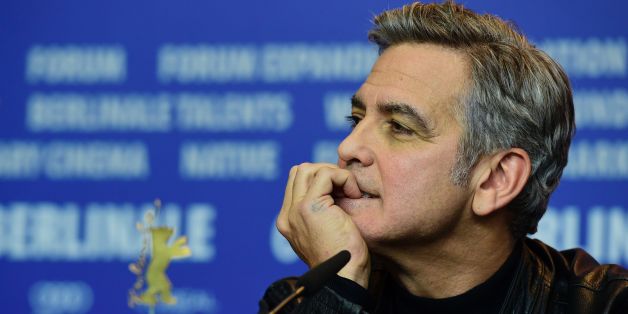 US actor George Clooney attends a press conference for the film 'Hail, Caesar!' screened as opening film of the 66th Berlinale Film Festival in Berlin on February 11, 2016.
Eighteen pictures will vie for the Golden Bear top prize at the event which runs from February 11 to 21, 2016. / AFP / John MACDOUGALL (Photo credit should read JOHN MACDOUGALL/AFP/Getty Images)