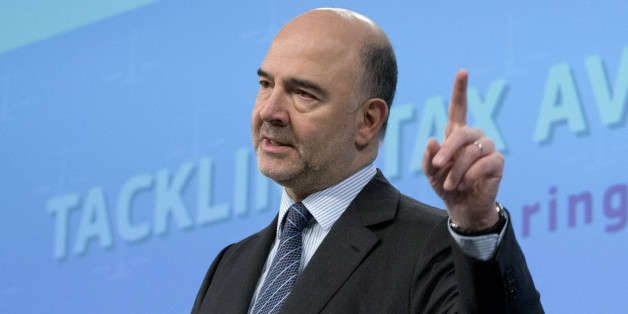 European Commissioner for Economic and Financial Affairs Pierre Moscovici speaks during a media conference at EU headquarters in Brussels on Thursday, Jan. 28, 2016. The European Union has unveiled new measures to combat tax evasion by big companies as part of efforts to end sweet deals between member countries and multinationals. (AP Photo/Virginia Mayo)