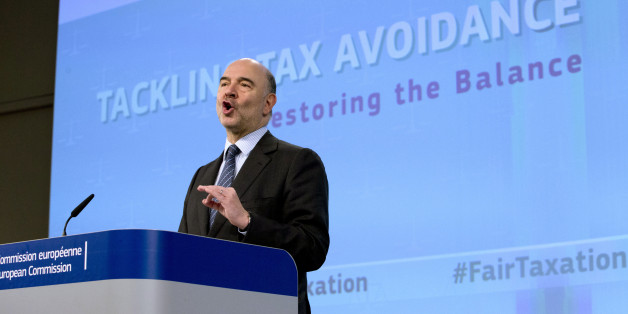 European Commissioner for Economic and Financial Affairs Pierre Moscovici speaks during a media conference at EU headquarters in Brussels on Thursday, Jan. 28, 2016. The European Union has unveiled new measures to combat tax evasion by big companies as part of efforts to end sweet deals between member countries and multinationals. (AP Photo/Virginia Mayo)