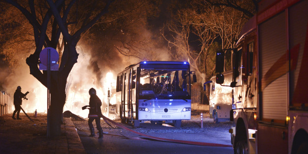 Firefighters work at a scene of fire from an explosion in Ankara, Wednesday, Feb. 17, 2016. A large explosion, believed to have been caused by a bomb, injured several people in the Turkish capital on Wednesday, according to media reports. Private NTV said the explosion occurred during rush hour in an area close to where military headquarters are located as a bus carrying military personnel was passing by. Several cars caught fire, the report said. Ambulances were seen rushing toward the scene. T