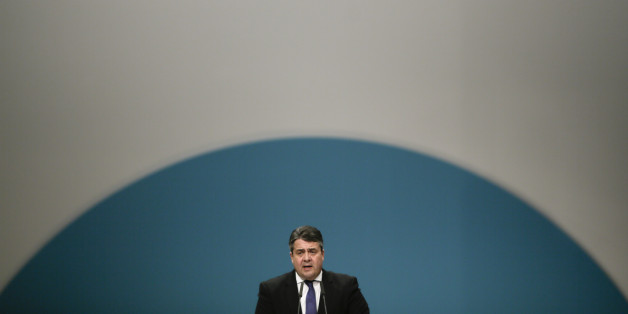 German Social Democratic Party, SPD, chairman Sigmar Gabriel delivers his speech during the party convention in Berlin, Friday, Dec. 11, 2015. (AP Photo/Markus Schreiber)