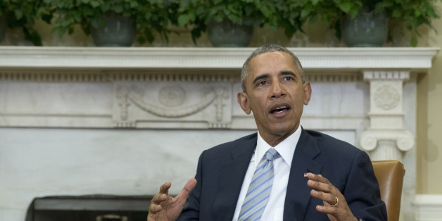 President Barack Obama talks to media in the Oval Office of the White House, in Washington, Wednesday, Feb. 17, 2016, at the bottom of a meeting, where he announced that former IBM CEO Sam Palmisano, former National Security Adviser Tom Donilon are being appointed as the Chair and Vice Chair, respectively, of the Commission on Enhancing National Cybersecurity. (AP Photo/Carolyn Kaster)