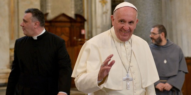 Pope Francis greets people after he prayed in Santa Maria Maggiore basilica upon his return in Rome today on February 18, 2016 after his trip to Mexico. / AFP / TIZIANA FABI (Photo credit should read TIZIANA FABI/AFP/Getty Images)