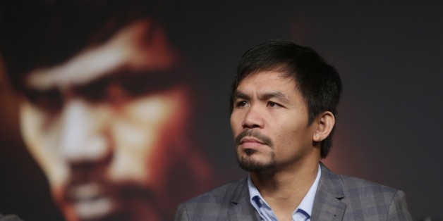 Manny Pacquiao listens during a news conference to promote an upcoming boxing match Thursday, Jan. 21, 2016, in New York. Pacquiao is scheduled to fight Timothy Bradley on April 9, 2016, in Las Vegas. (AP Photo/Frank Franklin II)