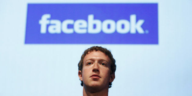 FILE - In this Oct. 13, 2010 file photo, Facebook founder Mark Zuckerberg speaks in the Galileo Auditorium on Microsoftâs Silicon Valley Campus in Mountain View, Calif. With so many investors becoming fans of the company, Facebook will be legally required to begin sharing more information about its finances and strategy by April 2012, according to documents distributed to prospective shareholders. (AP Photo/Jeff Chiu, File)