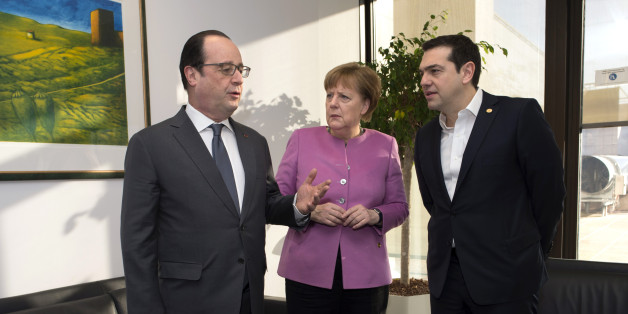French President Francois Hollande, left, and German Chancellor Angela Merkel, center, stand with Greek Prime Minister Alexis Tsipras during a meeting on the sidelines of an EU summit in Brussels on Friday, Feb. 19, 2016. British Prime Minister David Cameron faces tough new talks with European partners after through-the-night meetings failed to make much progress on his demands for a less intrusive European Union. (John Thys, Pool Photo via AP)
