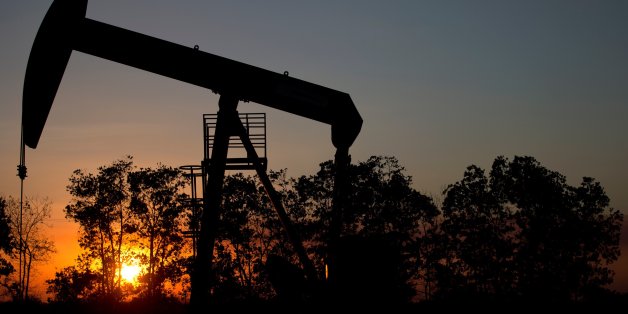 In this Feb. 19, 2015 photo, the sun sets behind an oil well in a field near El Tigre, a town within Venezuela's Hugo Chavez oil belt, formally known as the Orinoco Belt. President Nicolas Maduro, whose approval rating has plunged to around 25 percent, has no choice but to lean on state-fun oil company PDVSA to help Venezuela back on its feet and has been quietly trying to lure back foreign drillers. (AP Photo/Fernando Llano)