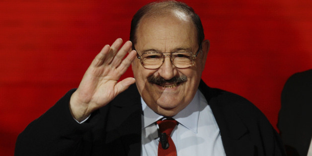 FILE - In a Sunday, Oct.31, 2010 file photo, Italian writer, medievalist, semiotician, philosopher, literary critic and novelists Umberto Eco waves to public during the Italian State RAI TV program in Milan, Italy. Eco, best known for the international best-seller âThe Name of the Rose,â died Friday, Feb. 19, 2016, according to spokeswoman Lori Glazer of Ecoâs American publisher, Houghton Mifflin Harcourt. He was 84. (AP Photo/Luca Bruno, File)