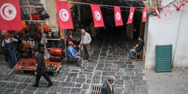 People walk through the Medina market in Tunis, Tunisia, Monday, Oct. 26, 2015. (AP Photo/Mosa'ab Elshamy)