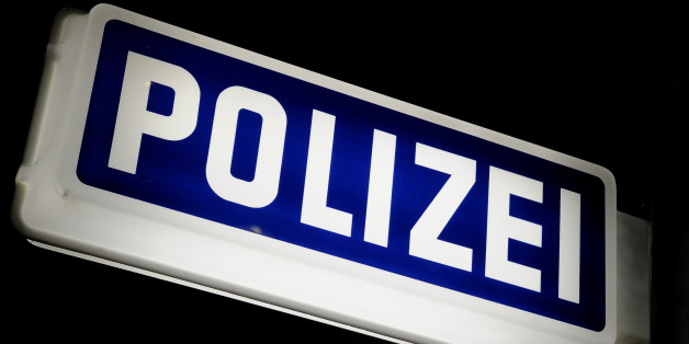 German police station sign in blue and white