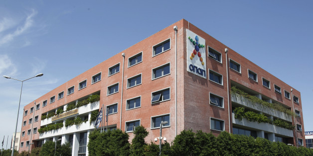 The headquarters of the OPAP gambling monopoly company, in Athens, Tuesday, May 24, 2011. The government announced last week that it had chosen advisers for privatization of the OPAP. Greece's main opposition leader has bluntly rejected a call for support from the prime minister for new austerity measures designed to pull the country out of its crippling debt crisis. (AP Photo/Thanassis Stavrakis)