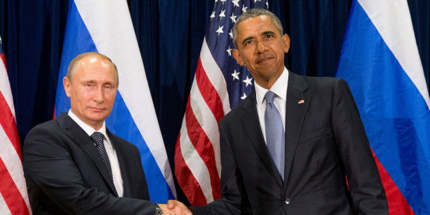 United States President Barack Obama, right, and Russia's President President Vladimir Putin pose for members of the media before a bilateral meeting Monday, Sept. 28, 2015, at United Nations headquarters. (AP Photo/Andrew Harnik)