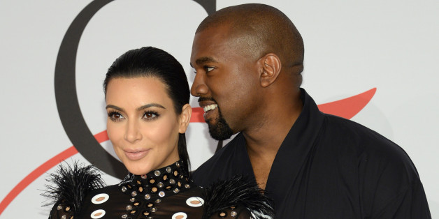 FILE - In this Monday, June 1, 2015, file photo, Kim Kardashian, left, and Kanye West arrive at the 2015 CFDA Fashion Awards at Alice Tully Hall, Lincoln Center, in New York. Kim Kardashian West and husband Kanye West welcomed a baby boy early Saturday, Dec. 5, 2015, in Los Angeles. This is the second child for the superstar couple: Daughter North was born in 2013. (Photo by Evan Agostini/Invision/AP, File)