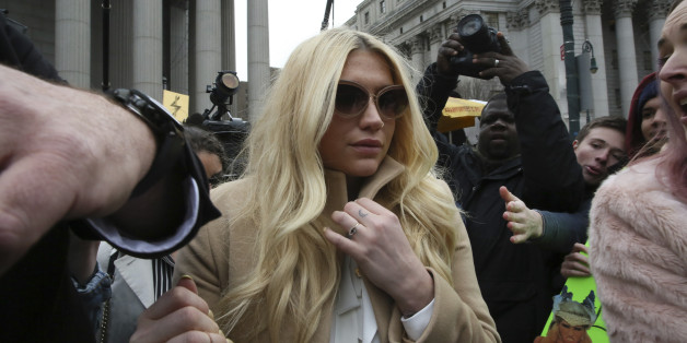 Pop star Kesha leaves Supreme court in New York, Friday, Feb. 19, 2016. (AP Photo/Mary Altaffer)