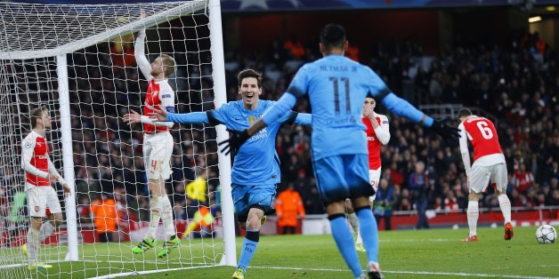 Barcelona's Lionel Messi celebrates after he scored the opening goal during the soccer Champions League round of 16 first leg soccer match between Arsenal and Barcelona at the Emirates stadium in London, Tuesday, Feb. 23, 2016. (AP Photo/Frank Augstein)