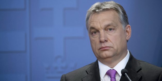 Hungarian Prime Minister Viktor Orban attends a joint press conference held with his British counterpart, David Cameron after their meeting in the Parliament building in Budapest, Hungary,Thursday Jan. 7, 2016. (Szilard Koszticsak/MTI via AP)