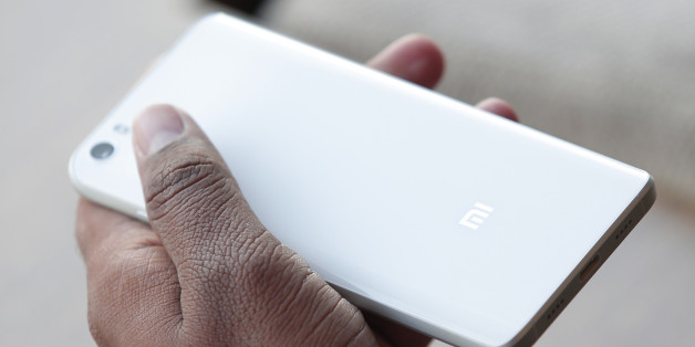 The new Xiaomi Mi5 is displayed during the Mobile World Congress wireless show in Barcelona, Spain, Wednesday, Feb. 24, 2016. Chineseâs leading smartphone maker Xiaomi has unveiled its new flagship device, the Mi 5, which it says is fast and lightweight. (AP Photo/Manu Fernandez)
