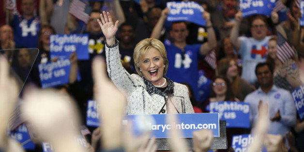 Democratic presidential candidate Hillary Clinton hugs Rep. James Clyburn, D-S.C., at her election night watch party after winning the South Carolina Democratic primary in Columbia, S.C., Saturday, Feb. 27, 2016. (AP Photo/Gerald Herbert)