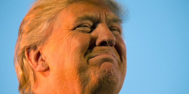 Republican presidential candidate Donald Trump pauses during while speaking at a rally at Millington Regional Airport in Millington, Tenn., Saturday, Feb. 27, 2016. (AP Photo/Andrew Harnik)