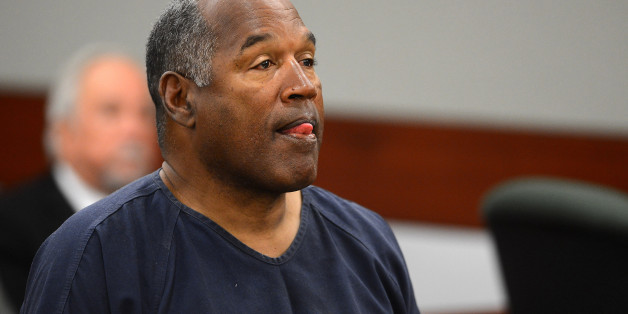O.J. Simpson en 2013 alors qu'il était poursuivi dans une affaire enlèvement et vol à main armée.