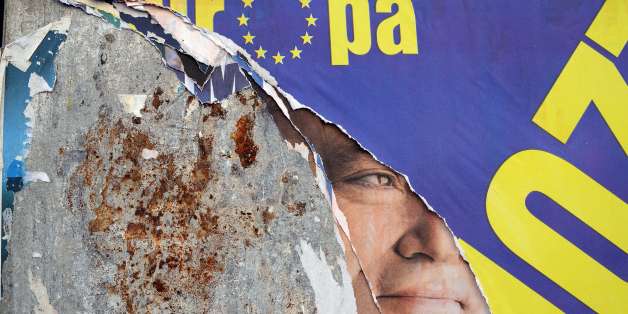 A banner of an Italian candidate for the European Parliament elections is seen on a wall in Rome on May 24, 2014. Latvia, Malta and Slovakia, who all joined the European Union in 2004, voted on May 24, 2014 in European Parliament elections expected to provide a major boost to anti-EU parties in several countrie AFP PHOTO/ Filippo MONTEFORTE (Photo credit should read FILIPPO MONTEFORTE/AFP/Getty Images)