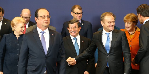 BRUSSELS, BELGIUM - MARCH 7: Turkish Prime Minister Ahmet Davutoglu (C), French President Francois Hollande (L 2), President of the European Council, Donald Tusk (R 3), Lithuanian President Dalia Grybauskaite (L) and Dutch Prime Minister Mark Rutte (R) pose for a photo after the EU-Turkey summit in Brussels, Belgium on March 7, 2016.
(Photo by Turkish Prime Ministry / Mustafa Aktas/Anadolu Agency/Getty Images)