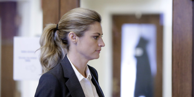 Sportscaster and television host Erin Andrews walks to the courtroom Monday, March 7, 2016, in Nashville, Tenn. Andrews' $75 million lawsuit against the franchise owner and manager of a luxury hotel and a man who admitted to making secret nude recordings of her in 2008 is to be turned over to the jury Monday. (AP Photo/Mark Humphrey)