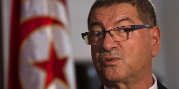 Tunisian Prime Minister Habib Essid speaks with The Associated Press during an interview ahead of a two-day conference in Madrid on combating the type of terrorism targeting foreign tourists that has hit his country twice over the last year, Spain, Tuesday, Oct. 27, 2015. (AP Photo/Emilio Morenatti)