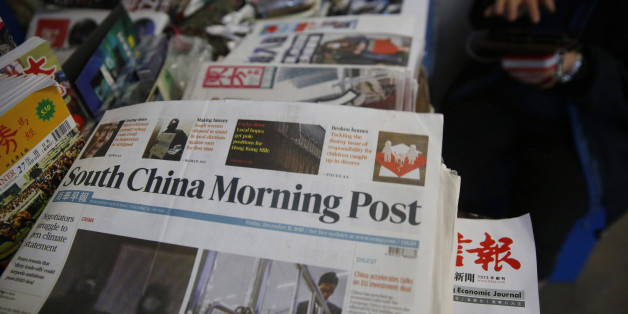 Copies of South China Morning Post are sold at a news stand in Hong Kong, Friday, Dec. 11, 2015. Chinese e-commerce giant Alibaba says itâs buying Hong Kong's leading English language newspaper, the South China Morning Post. Alibaba Group said late Friday it signed a deal with publisher SCMP Group to buy the Post and the companyâs other media assets, which also include magazines, outdoor advertising and digital media. (AP Photo/Kin Cheung)