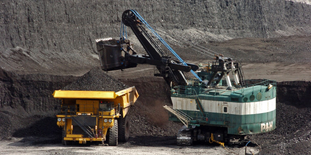 FILE - In this April 4, 2013 file photo, a mechanized shovel loads coal onto a haul truck at the Cloud Peak Energy's Spring Creek mine near Decker, Mont. An Obama administration effort to overhaul coal sales from public lands will be put to its first test as companies seek to advance two major mining projects in the Western U.S. Federal and state officials are meeting Wednesday, Jan. 27, 2016, to consider the request. Cloud Peak Energy and Lighthouse Resources Inc. wants to mine a combined 644 m