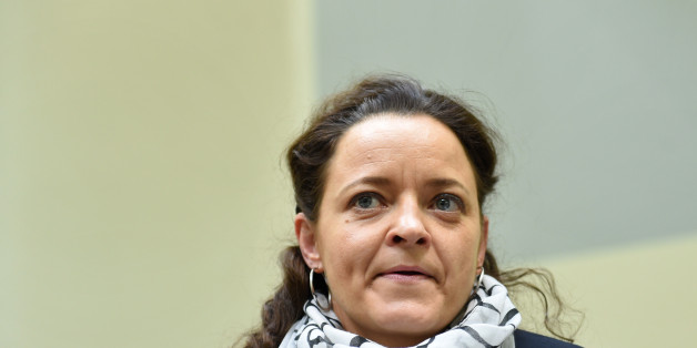 Defendant Beate Zschaepe waits for the continuation of her trial at a courtroom in Munich, southern Germany, March 2, 2016. The lone surviving suspect in a neo-Nazi murder case that shocked Germany is accused of helping found a neo-Nazi cell, the National Socialist Underground (NSU), and of complicity in the murders of eight Turks, a Greek and a German police woman across Germany between 2000 and 2007, as well as two bombings in immigrant areas of Cologne and 15 bank robberies. / AFP / POOL / CH