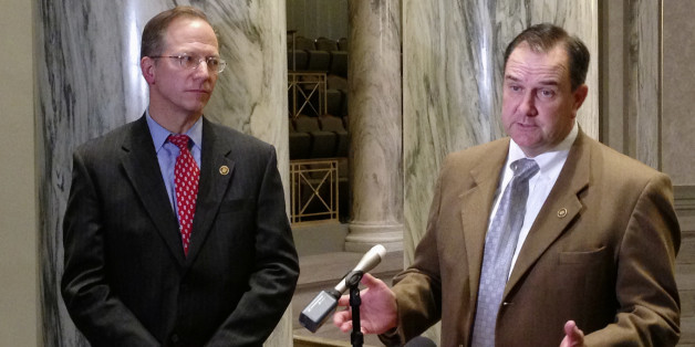 Missouri Senate Majority Leader Mike Kehoe talks with reporters as Republican Sen. Bob Onder looks on Wednesday, March 9, 2016, at the Missouri Capitol in Jefferson City. Republican senators used a rare procedural move to shut off a Democratic filibuster and force a vote Wednesday on a proposed state constitutional amendment sponsored by Onder. The measure would prohibit government penalties against some businesses and individuals who cite religious beliefs while declining to provide wedding-rel
