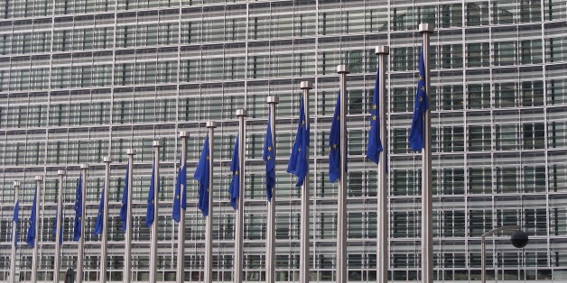 There are many EU flags in front of the European Commission building in Brussels. The building is huuuuge. I wonder how many offices are in it.