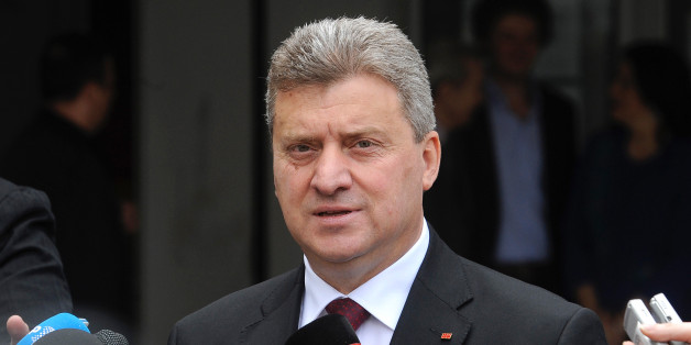 Macedonia's incumbent President Gjorge Ivanov talks to the media after casting his ballot for the elections, in Skopje, Macedonia, Sunday, April 27, 2014. Polls opened for Macedonia's double election, a presidential election runoff and snap national elections. Conservatives are favored to win both contests. (AP Photo/Boris Grdanoski)