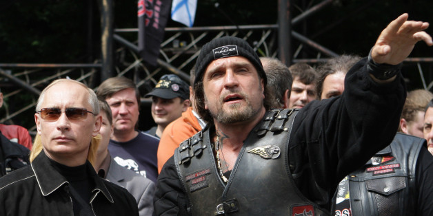 Russian Prime Minister Vladimir Putin, left, and leader of Nochniye Volki (the Night Wolves) biker group, Alexander Zaldostanov, also known as Khirurg (the Surgeon), right, seen during Putin's visit to the group's club in Moscow, Tuesday, July 7, 2009. Putin met Tuesday Russian bikers before their departure to the Ukraine's Crimean port of Sevastopol to take part in the upcoming 13th international motorbike show in support of Russia's Black Sea Fleet and marking the 65th anniversary of the city's liberation from Nazi Germany troops during the World War II.(AP Photo/RIA-Novosti, Alexei Druzhinin, Pool)(AP Photo/RIA-Novosti, Alexei Druzhinin, Pool)