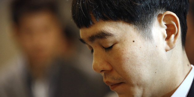 South Korean professional Go player Lee Sedol waits before entering the venue for the third match of the Google DeepMind Challenge Match against Google's artificial intelligence program, AlphaGo, in Seoul, South Korea, Saturday, March 12, 2016. (AP Photo/Lee Jin-man)