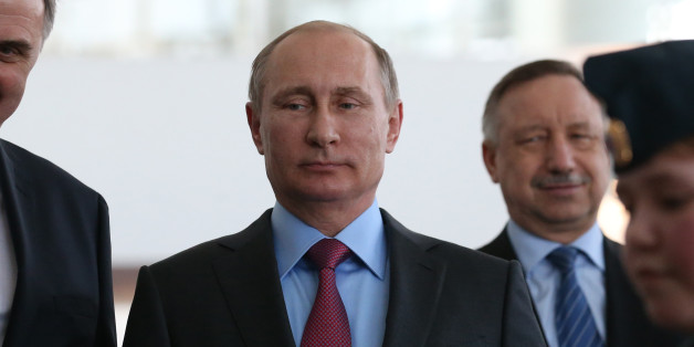 YAROSLAVL, RUSSIA - MARCH 14: (RUSSIA OUT) Russian President Vladimir Putin attends a road traffic safety exhibition March 14, 2016 in Yaroslavl, Russia. The Kremlin reported that Putin is making a one-day visit to the city in central Russia to attend the Russian State Council presidium's meeting on road traffic safety. (Photo by Mikhail Svetlov/Getty Images)
