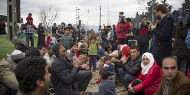 IDOMENI, GREECE - 2016/03/12: Thousands of refugees from Syria are locked in Idomeni on the border between Greece and Macedonia. The borders are closed, the hygienic and sanitary conditions are poor, many volunteers are helping in every way there're thousands of men, women and children stuck between the railroad tracks. (Photo by Davide Bosco/Pacific Press/LightRocket via Getty Images)