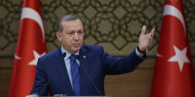 Turkish President Recep Tayyip Erdogan addresses a meeting of local administrators at his palace in Ankara, Turkey, Wednesday, March 16, 2016. Erdogan said Wednesday the United States and Russia were arming the Kurdish rebel group PKK which Turkey considers a terrorist organization. Ankara considers the PKK and the Syria-based YPG, or Kurdish Peopleâs Protection Units, to be terrorist organizations. (Murat Cetinmuhurdar, Presidential Press Service, Pool via AP )